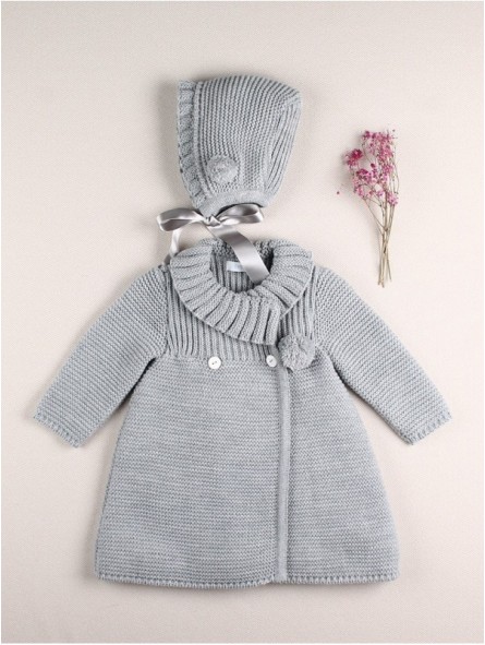 Knitted coat and bonnet with pompoms