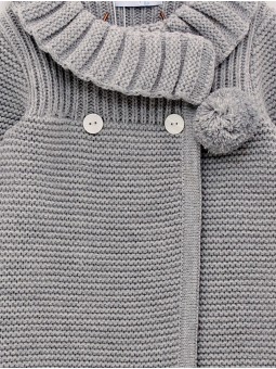 Girl’s knit coat and bonnet