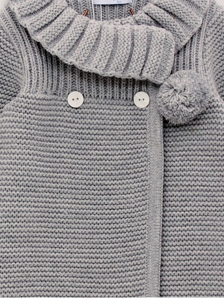 Girl’s knit coat and bonnet