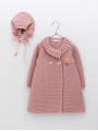 Girl’s knit coat and bonnet